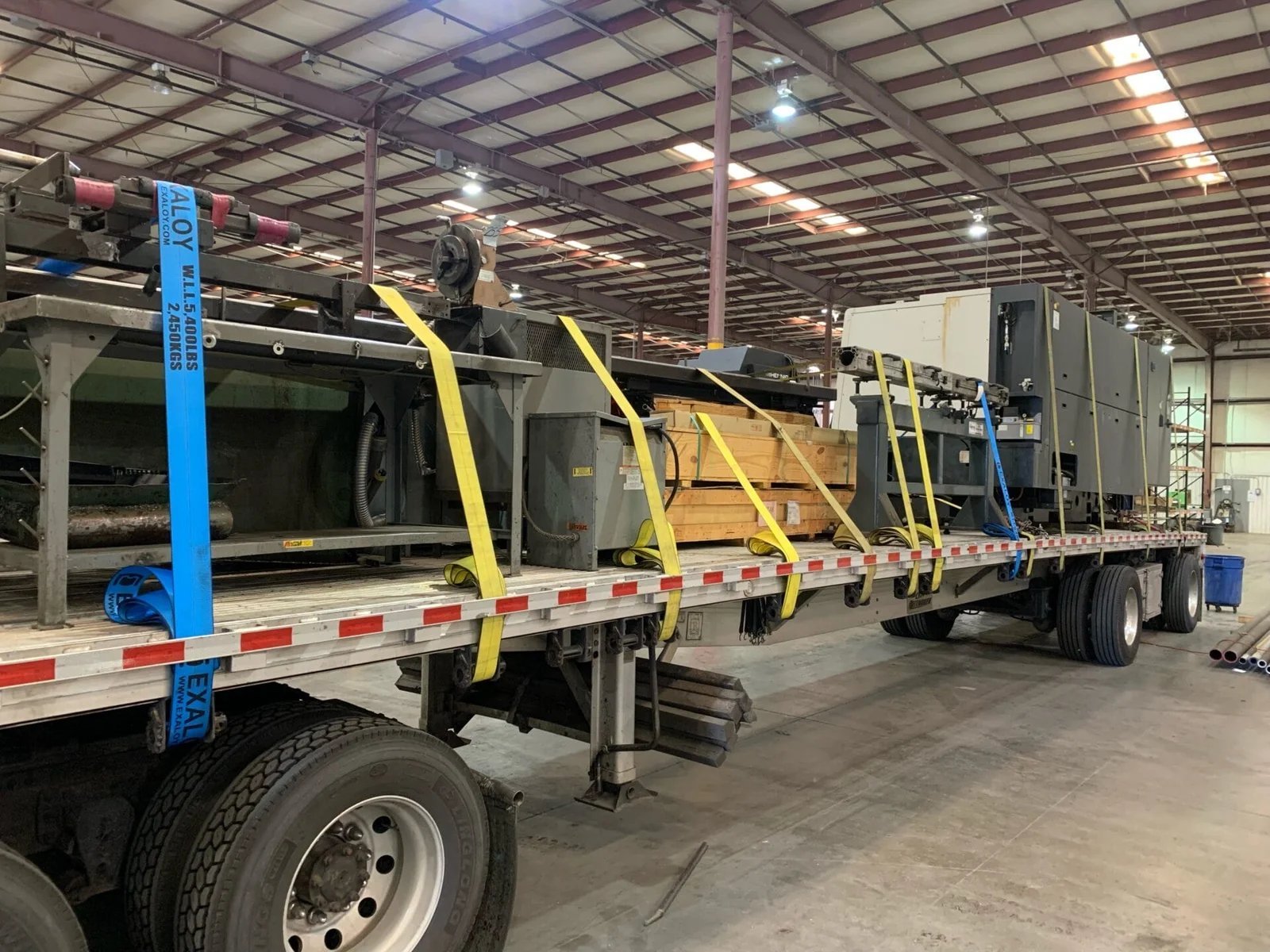 Machinery secured flatbed international machinery movers AZVIR USA Mexico